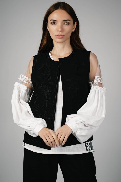 Embroidered women's vest "Petrykivka" black - bright ornaments on a classic background.