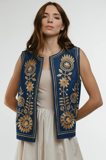 Embroidered women's vest "Petrykivka" jeans - bright ornaments on a classic background.