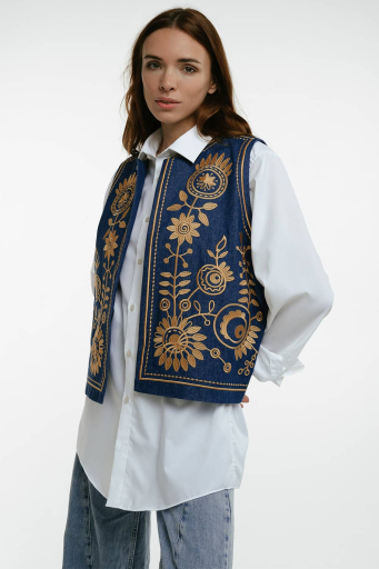 Embroidered women's vest "Petrykivka" jeans - bright ornaments on a classic background.