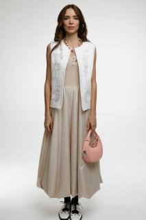 Embroidered women's vest "Petrykivka" milk - bright ornaments on a classic background.