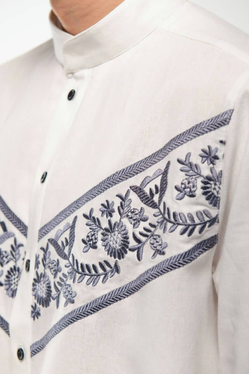 White embroidered men's jacket is a classic that emphasizes the purity of traditions