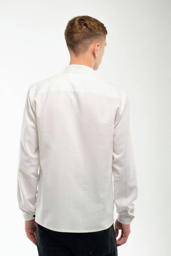 White embroidered men's jacket is a classic that emphasizes the purity of traditions