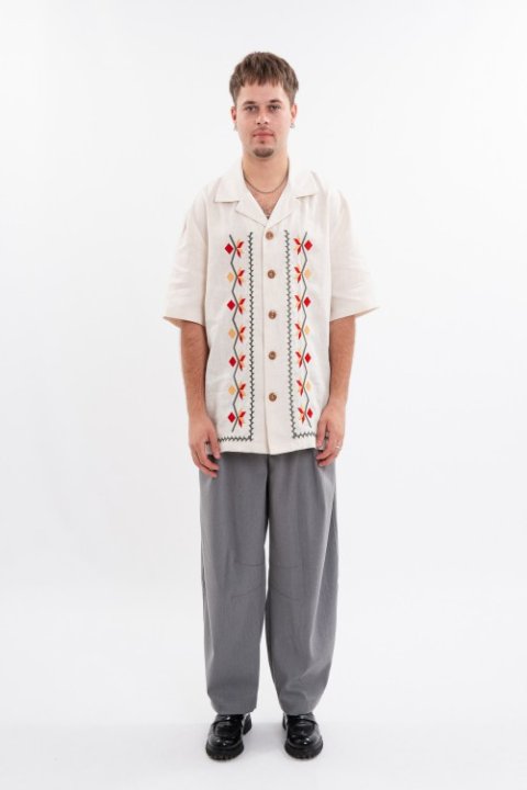 White embroidered men's jacket is a classic that emphasizes the purity of traditions