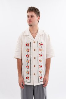 White embroidered men's jacket is a classic that emphasizes the purity of traditions